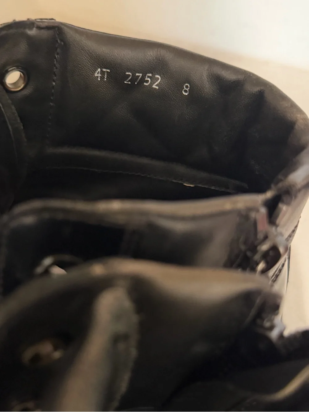 Authentic Prada Black High-Top Leather Sneakers with Red Logo